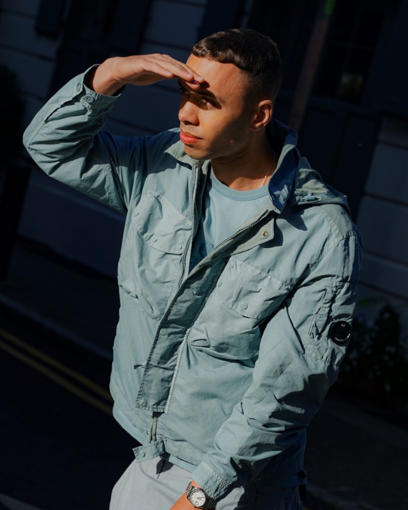 Creator in streetwear on location for a fashion campaign