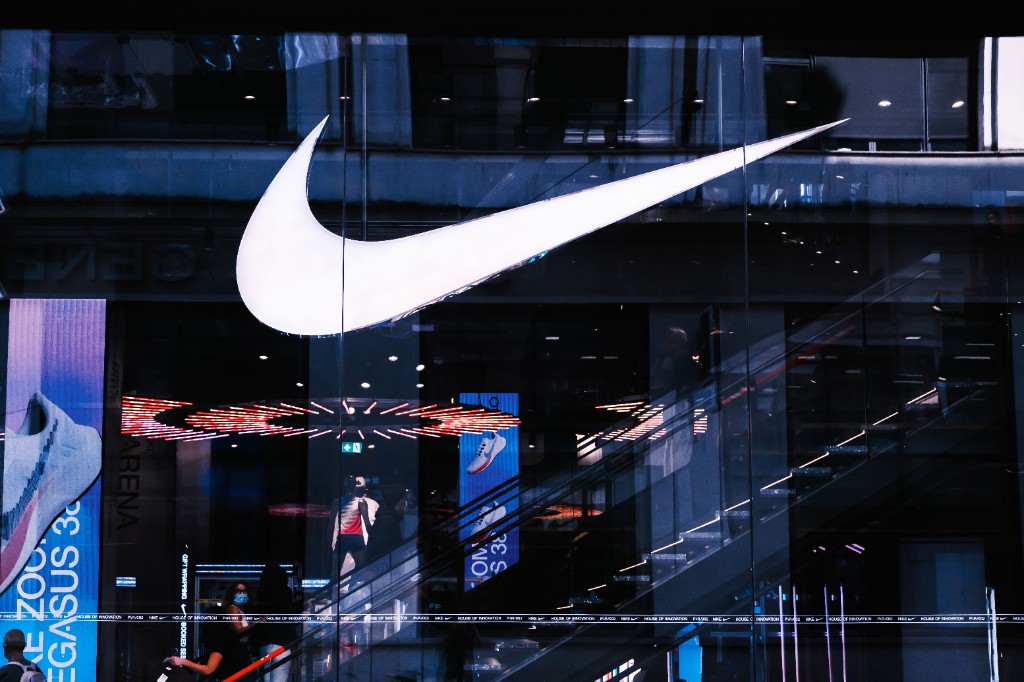 Nike House of Innovation flagship store with illuminated swoosh and digital product displays